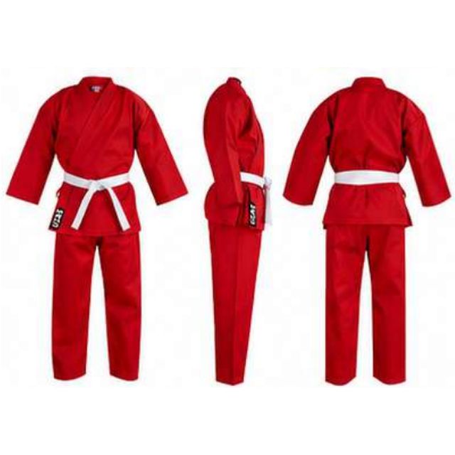 Red student karate gi with white belt and embroidered label, an example of a custom coloured karate uniform for a dojo