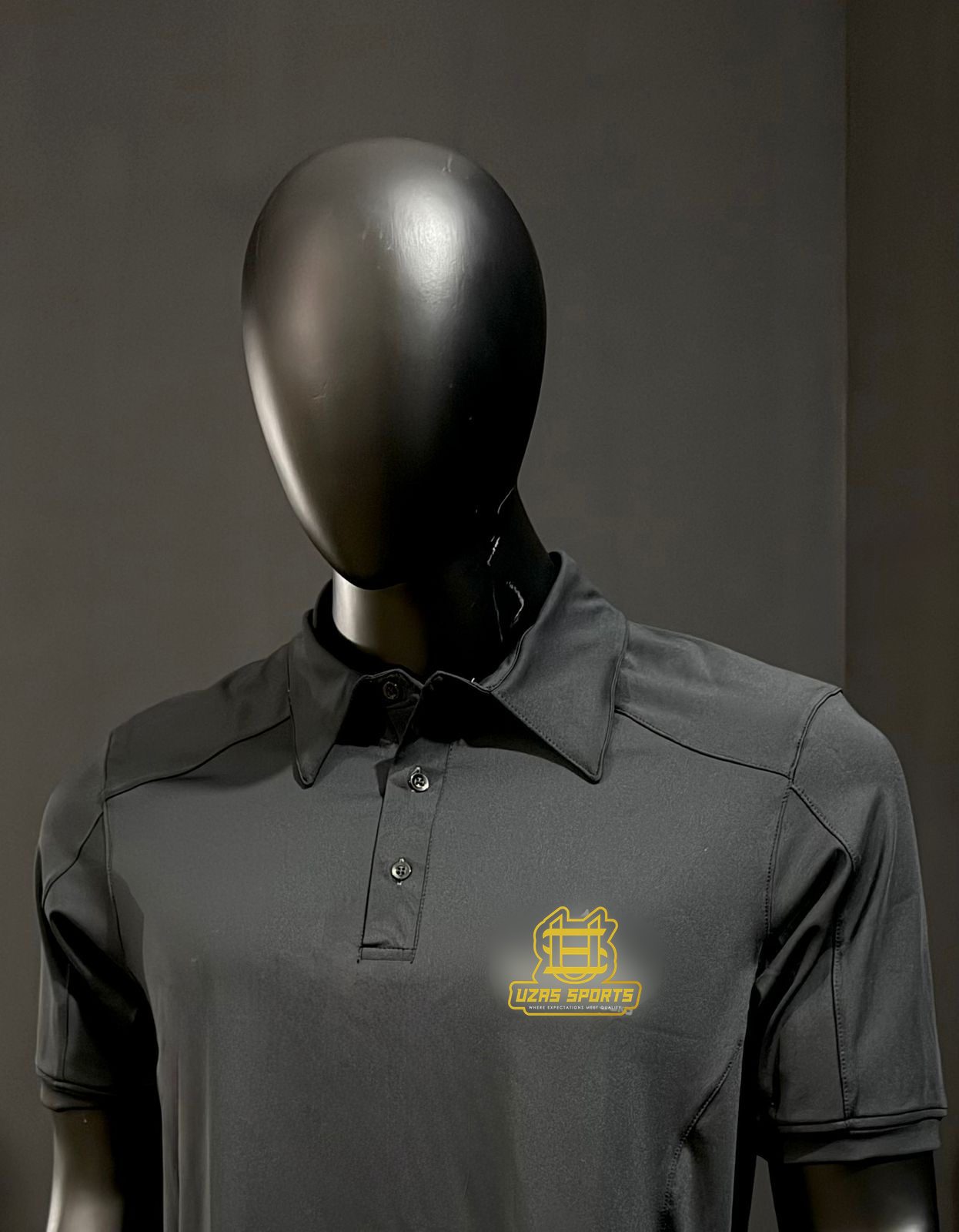 Charcoal polo shirt with an embroidered chest logo (customer logo replaced)