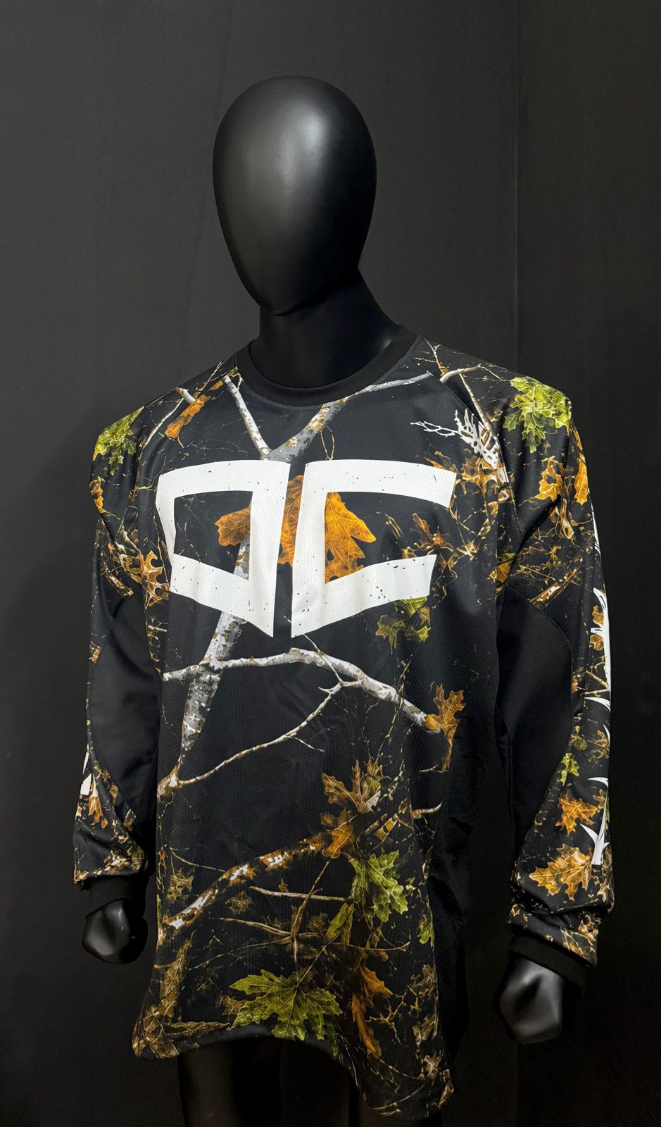 Sublimated camo jersey with a letter logo