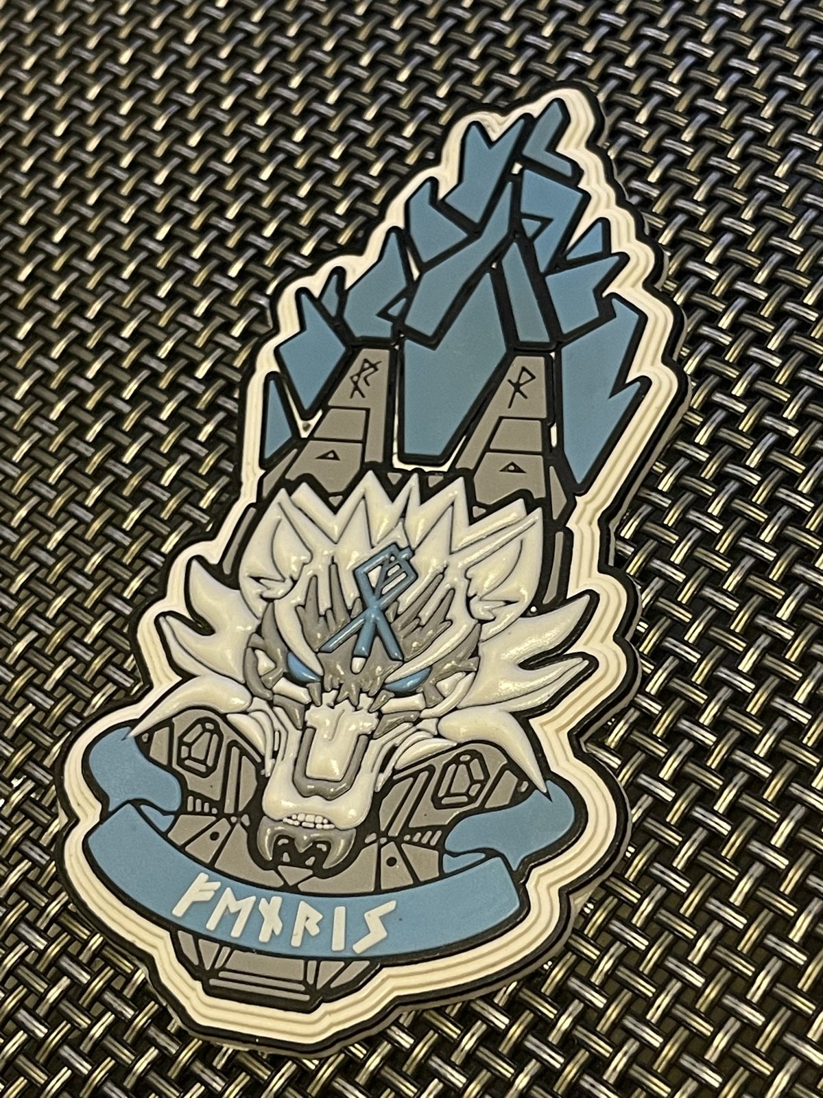 3D PVC patch with a layered wolf design made by UZAS Sports