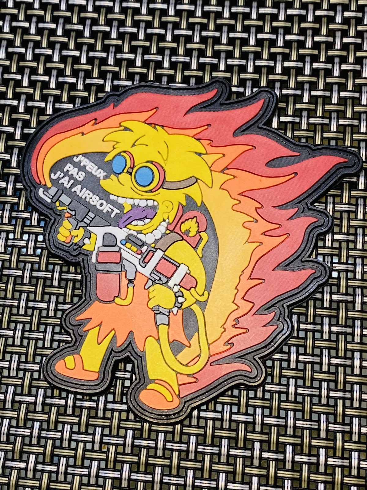 Full-colour PVC patch with a cartoon character design