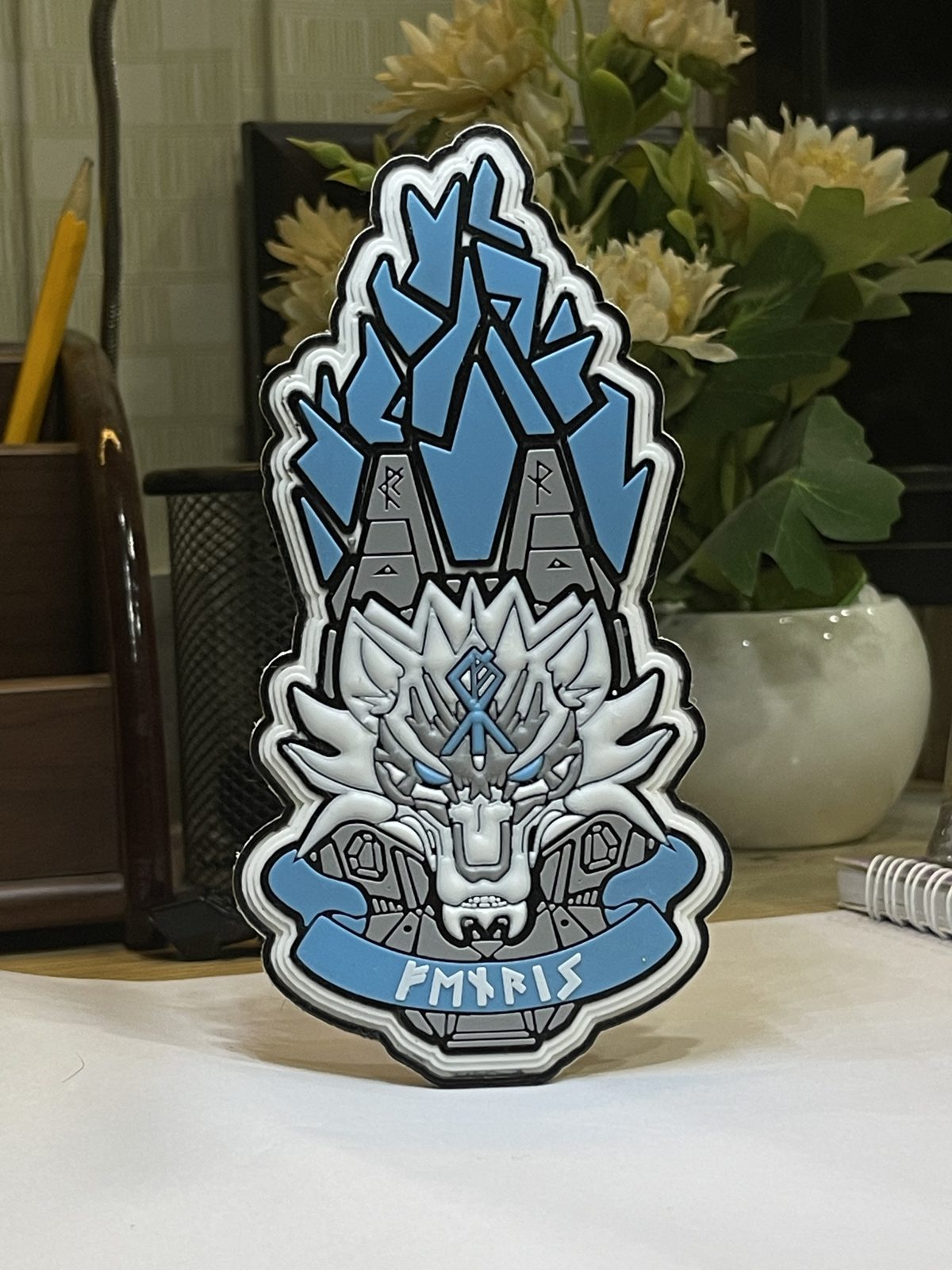 3D PVC wolf patch standing on a desk