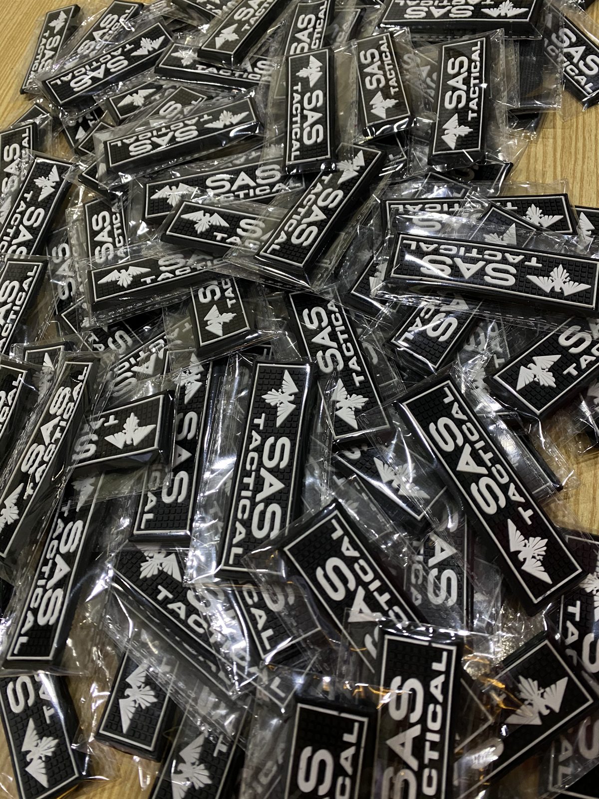 Hundreds of black PVC patches from one order