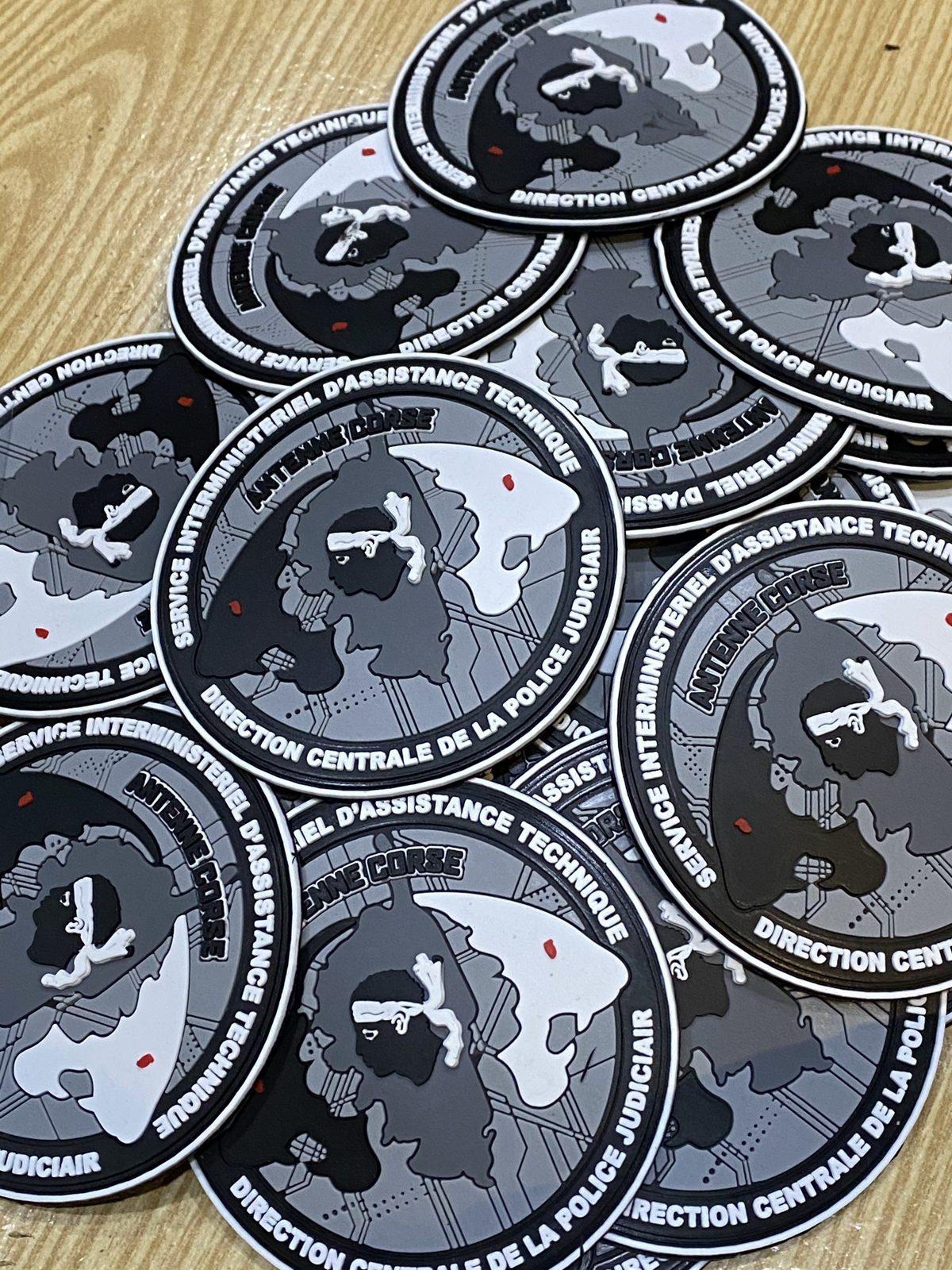 Round grey PVC patches in a bulk order